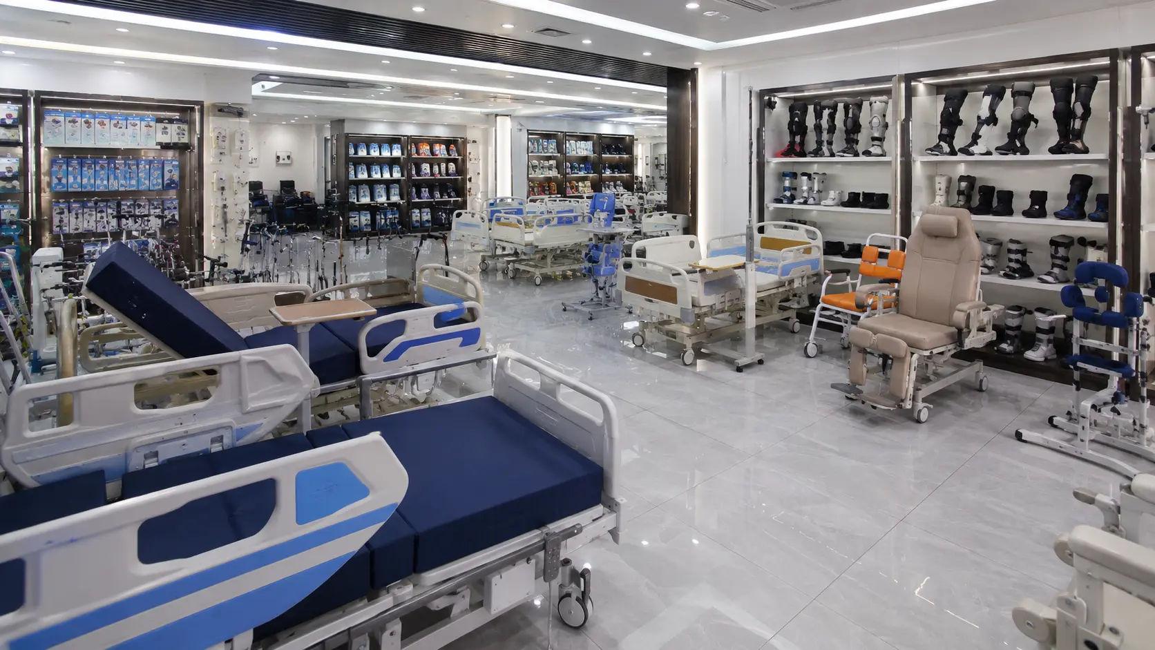 Medical beds and rehabilitation equipment displayed for procurement review